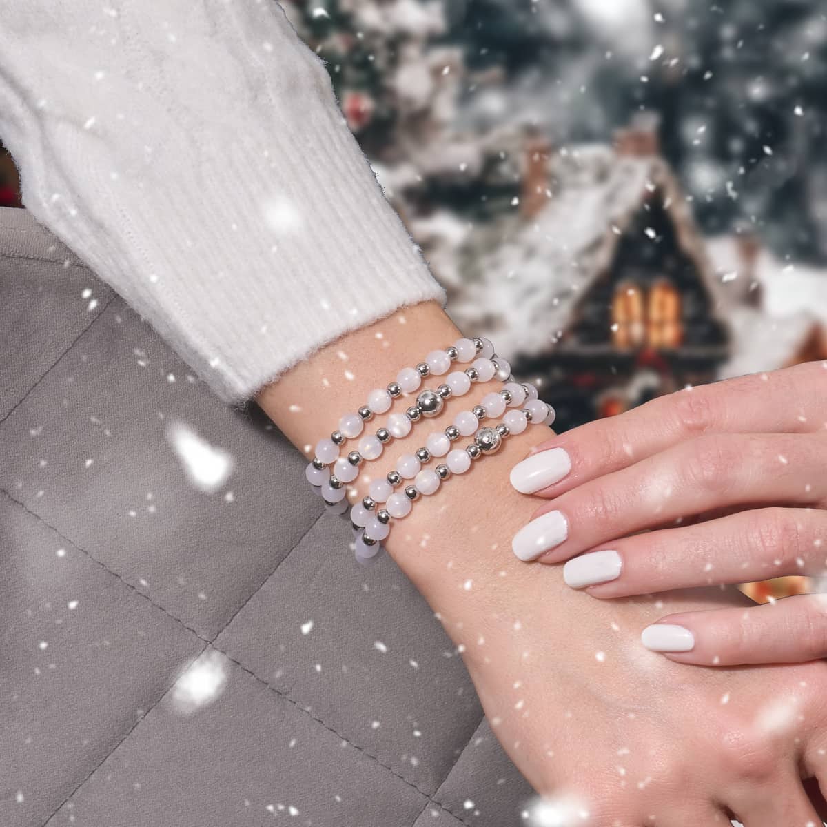 Shimmering Frost Dreamscape Opal Wrap on wrist with iridescent white opaline beads and stainless steel accents by NOGU